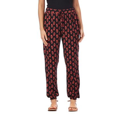 Red Herring Black and red floral print trousers